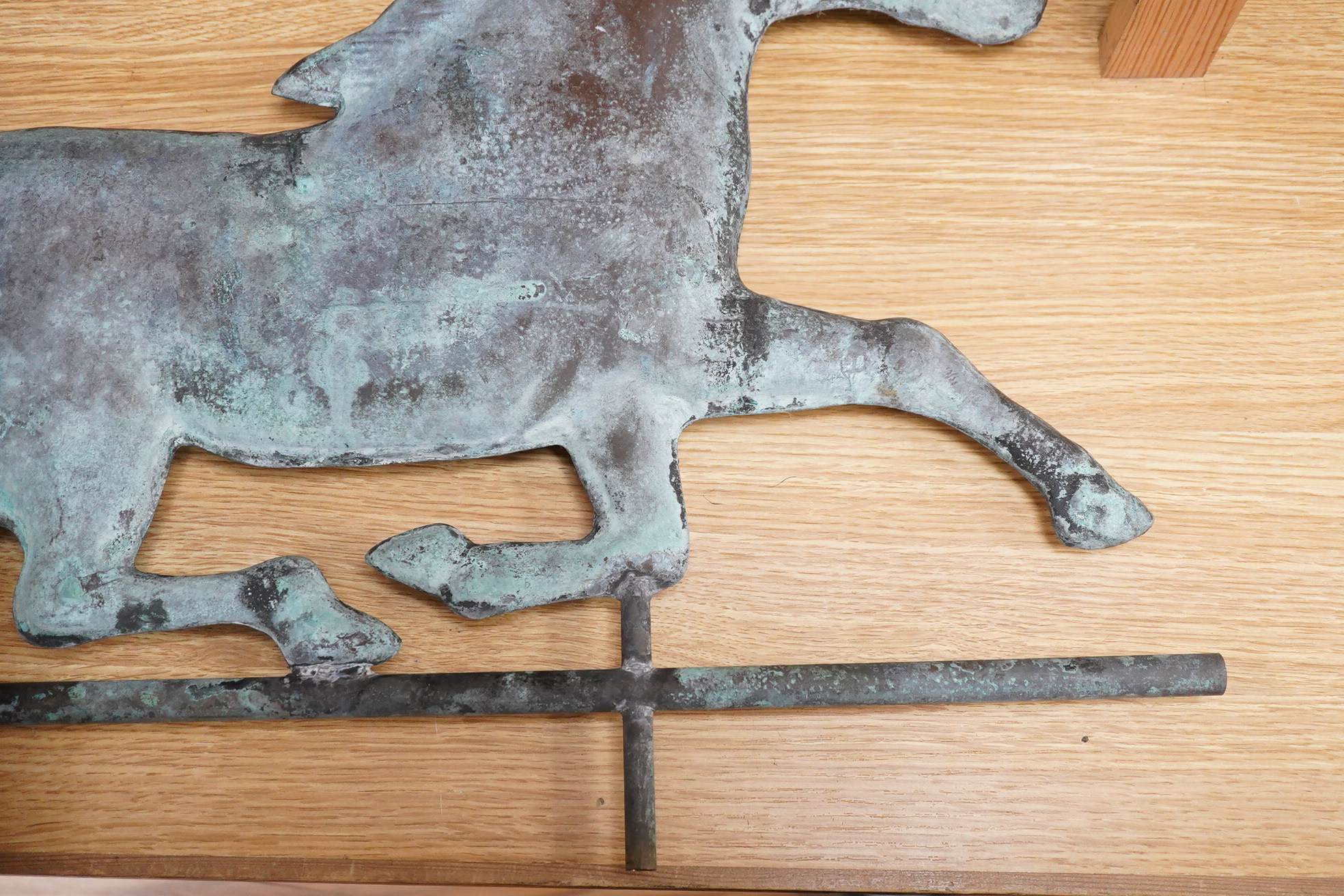 A copper ‘horse’ weather vane, 71cm wide.